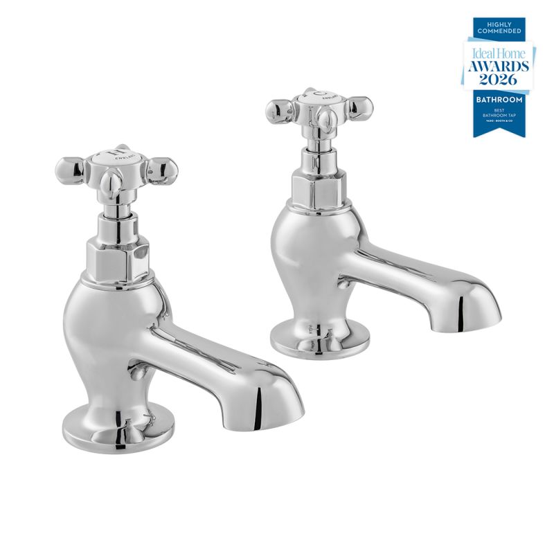 Booth & Co. Axbridge bath pillar taps with cross handles, finished in a high-shine polished chrome with white ceramic.