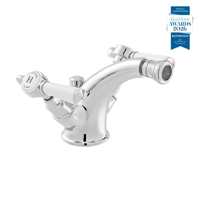 Booth & Co. Axbridge mono bidet mixer with a pop up basin waste with lever handles, finished in a high-shine polished chrome with white ceramic accents.