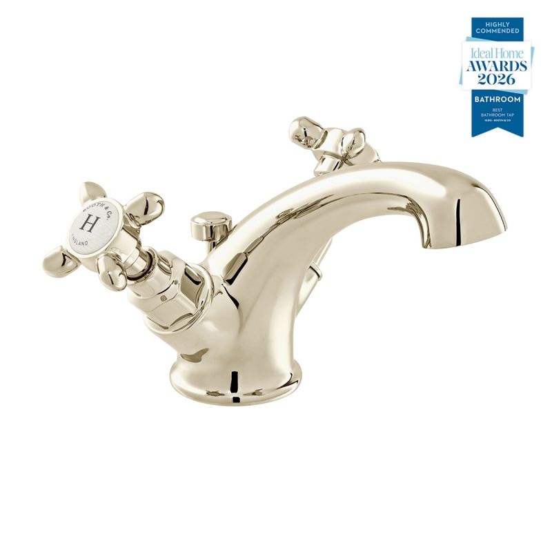 Booth & Co. Axbridge Mono basin mixer tap with a pop up basin waste and cross handles, finished in a high-shine bright nickel with crackled off-white ceramic accents.