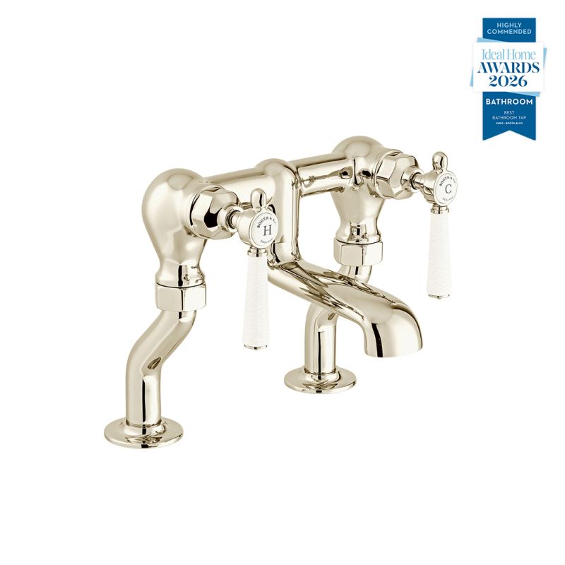 Booth & Co. Axbridge bath filler tap withlever handles, finished in a high-shine bright nickel with crackled off-white ceramic accents.