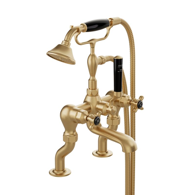 Booth & Co. Axbridge bath shower mixer tap with shower kit and cross handles, finished in brushed brass with black ceramic accents.