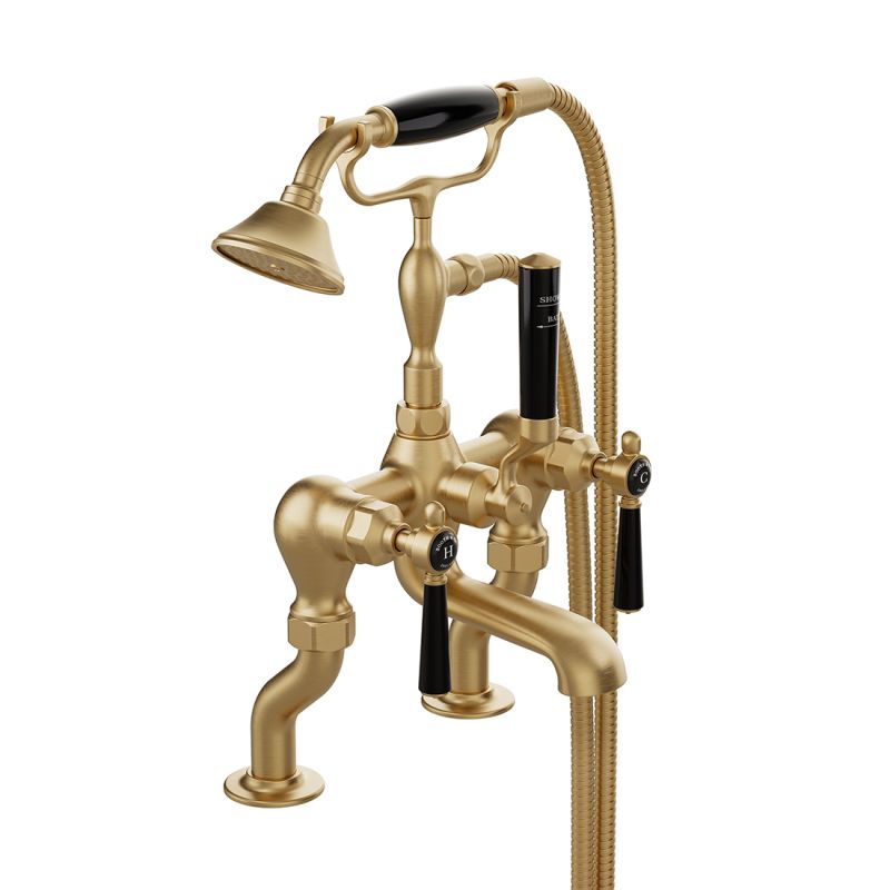 Booth & Co. Axbridge bath shower mixer tap with shower kit and lever handles, finished in brushed brass with black ceramic accents.
