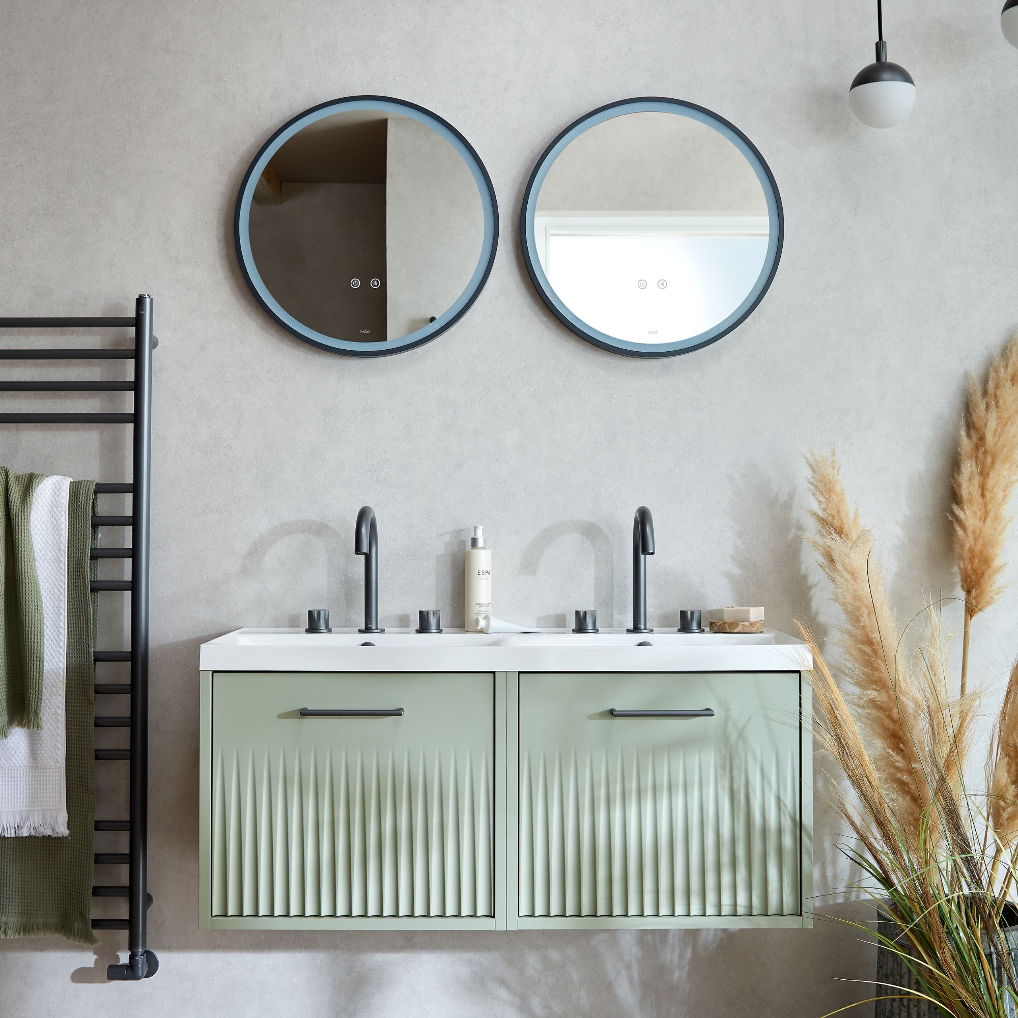 Family bathroom with double vanity in sage green