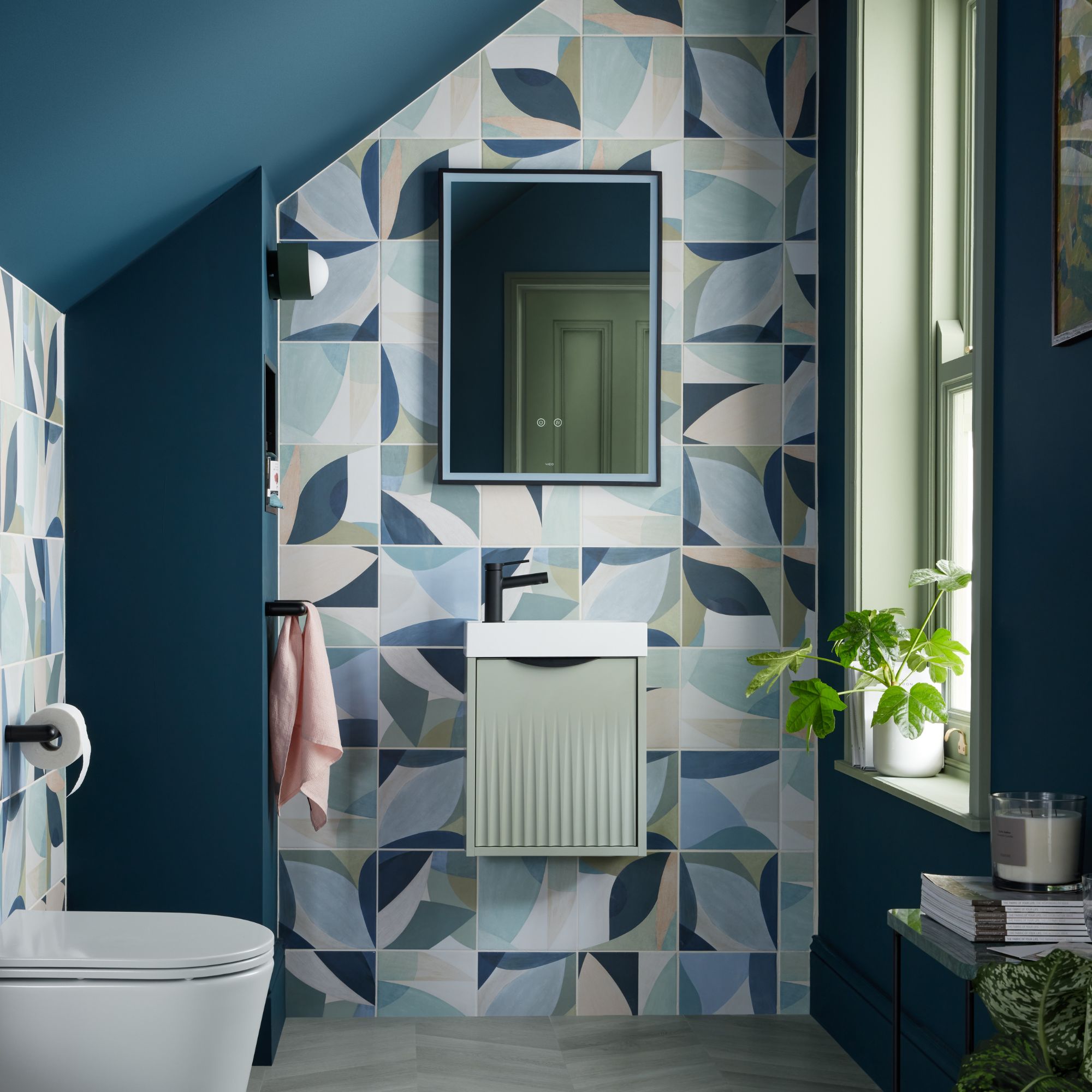 Cloakroom style bathroom with wall hung fluted vanity 